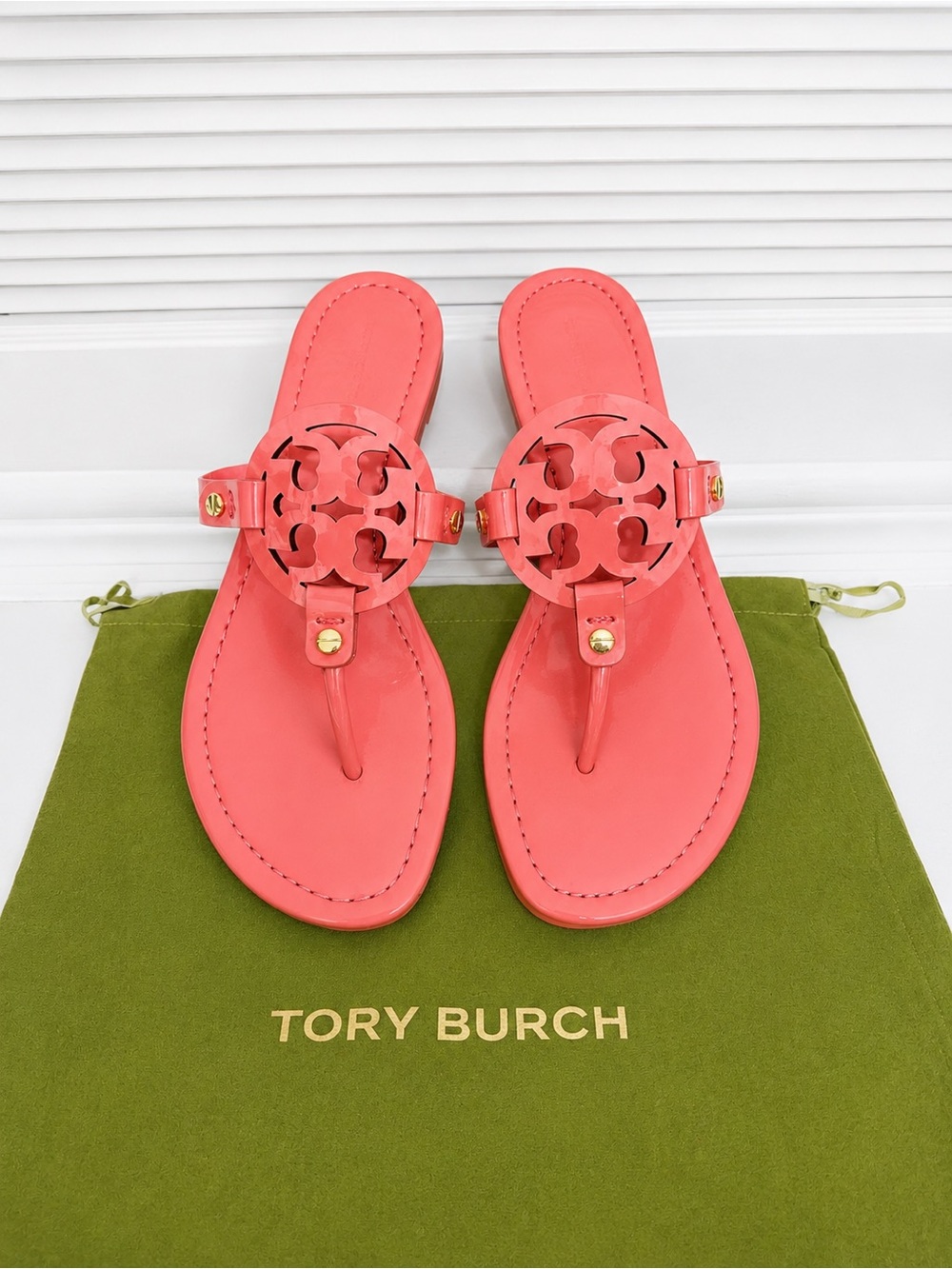 NWT Size 8 Tory Burch⁠ Miller Patent Leather sandals in Coral Crush Pink.